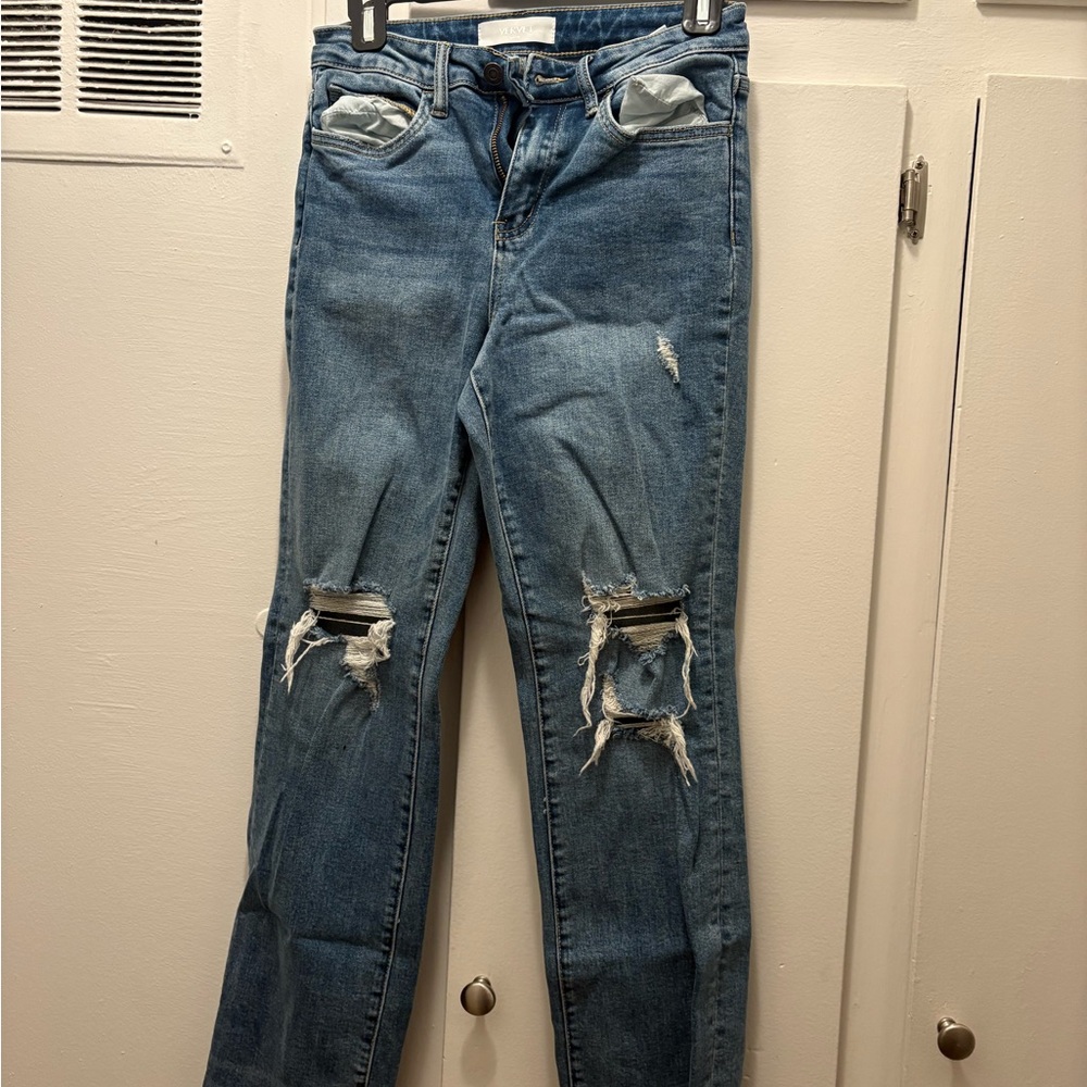 Distressed Blue Jeans